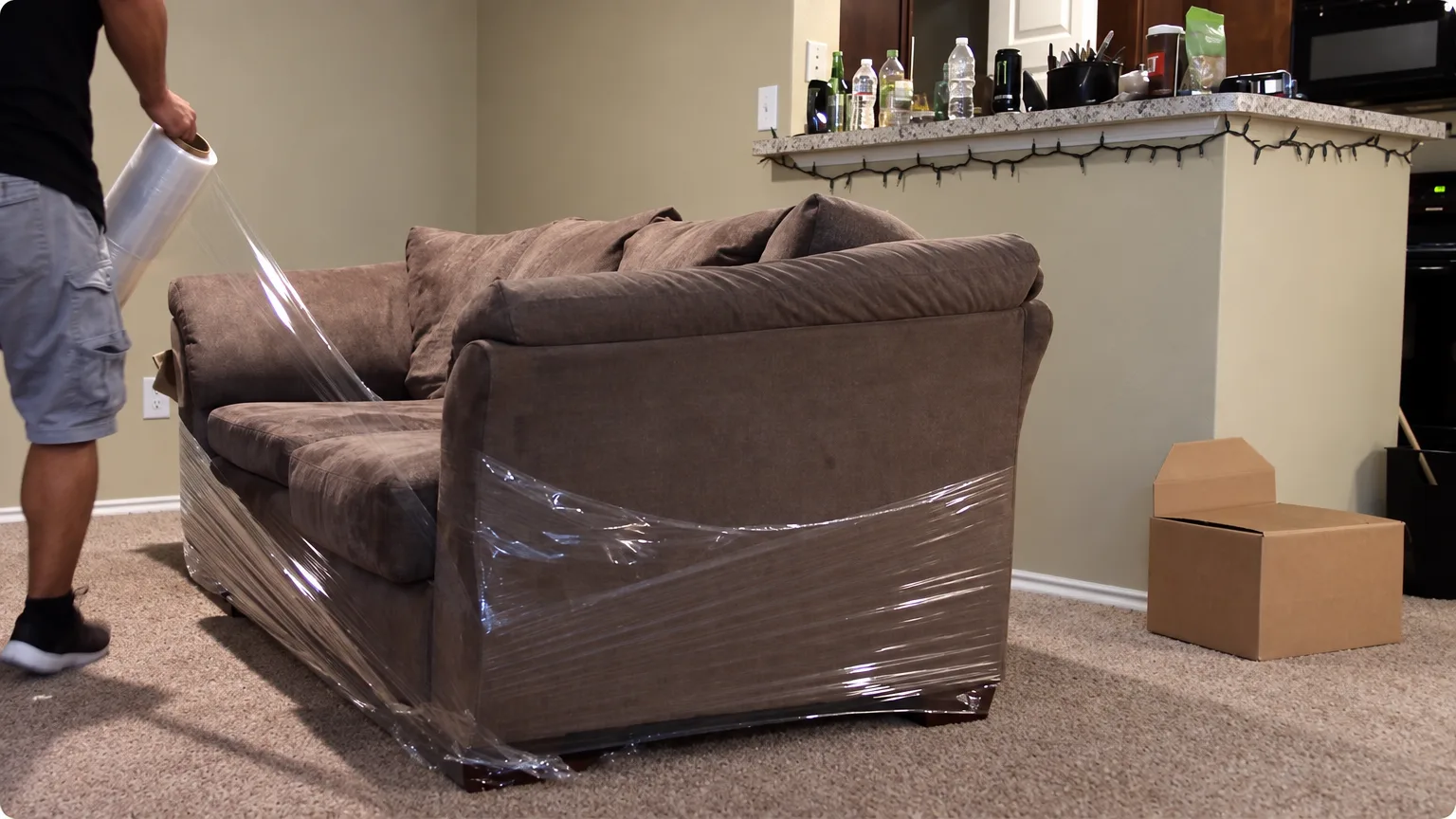 Movers completing a careful unloading sequence