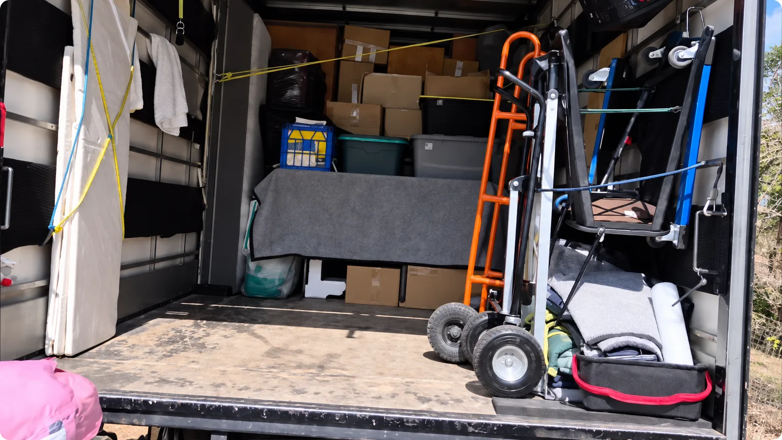 Movers completing a careful unloading sequence